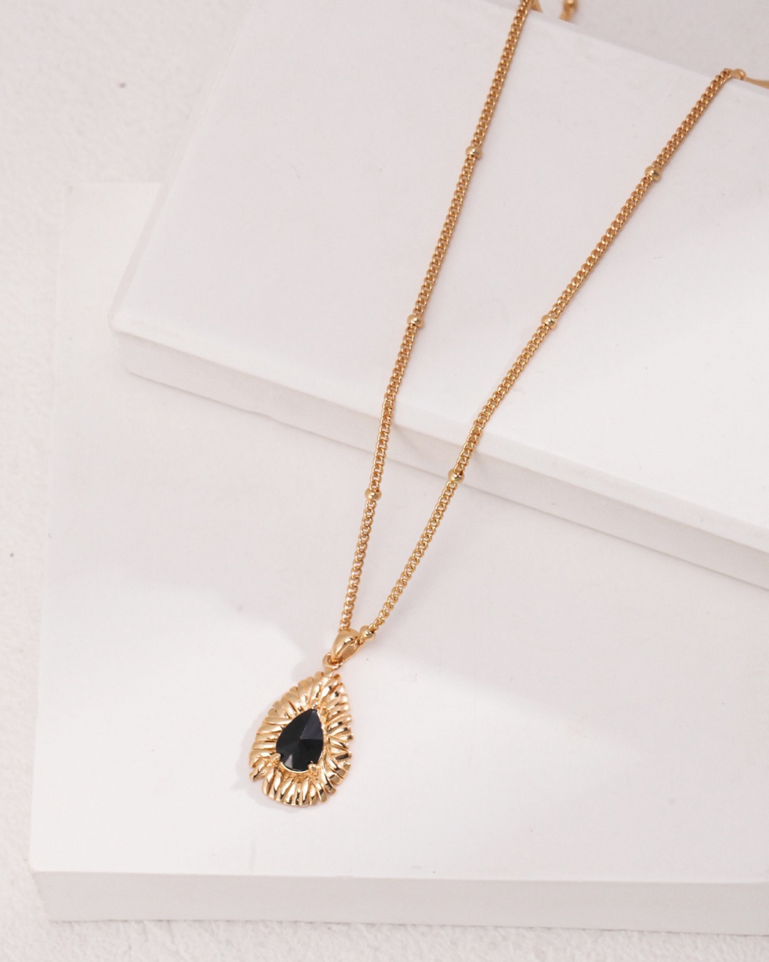 How to Style Pendant Necklaces