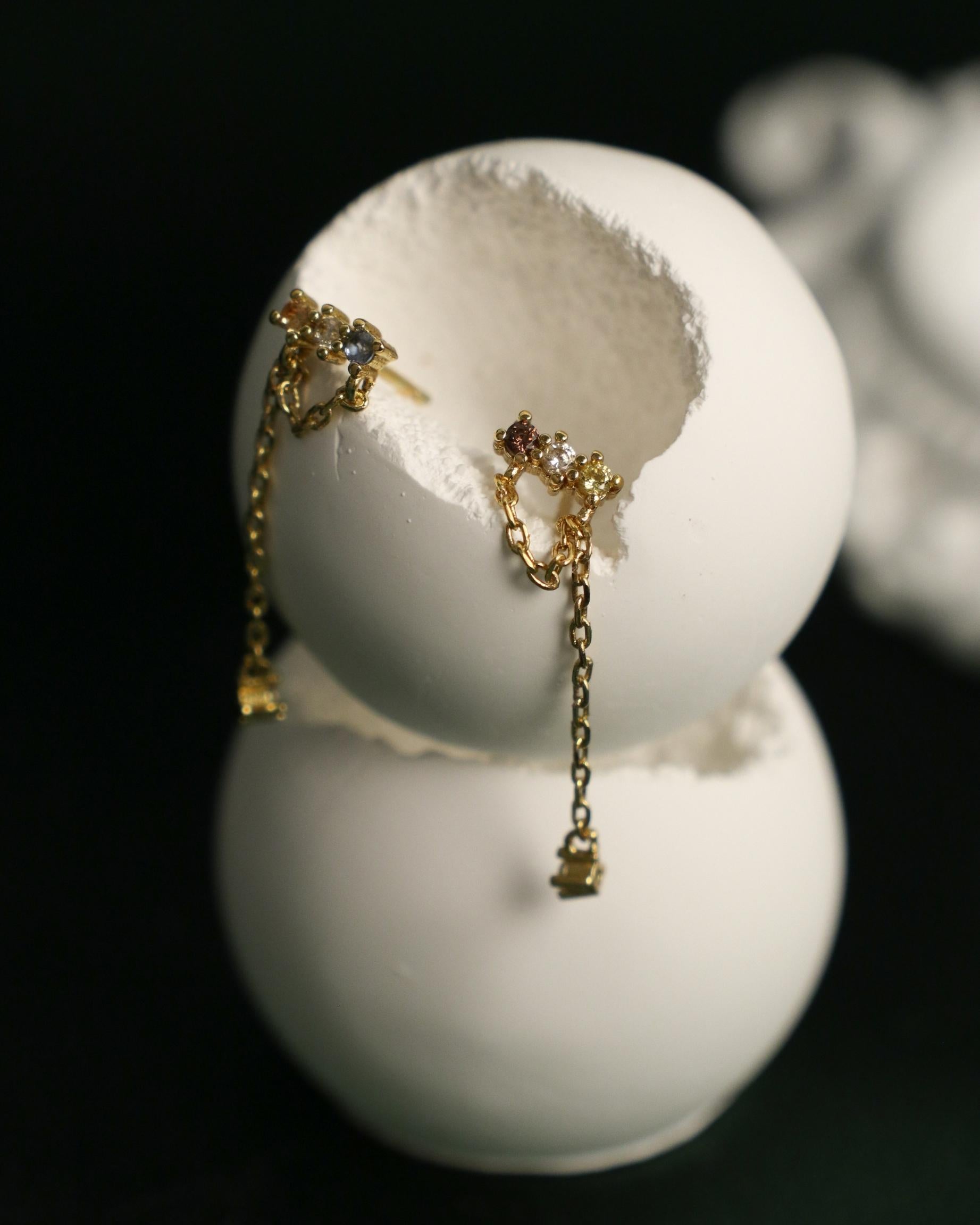 dangling chain and zirconia earrings