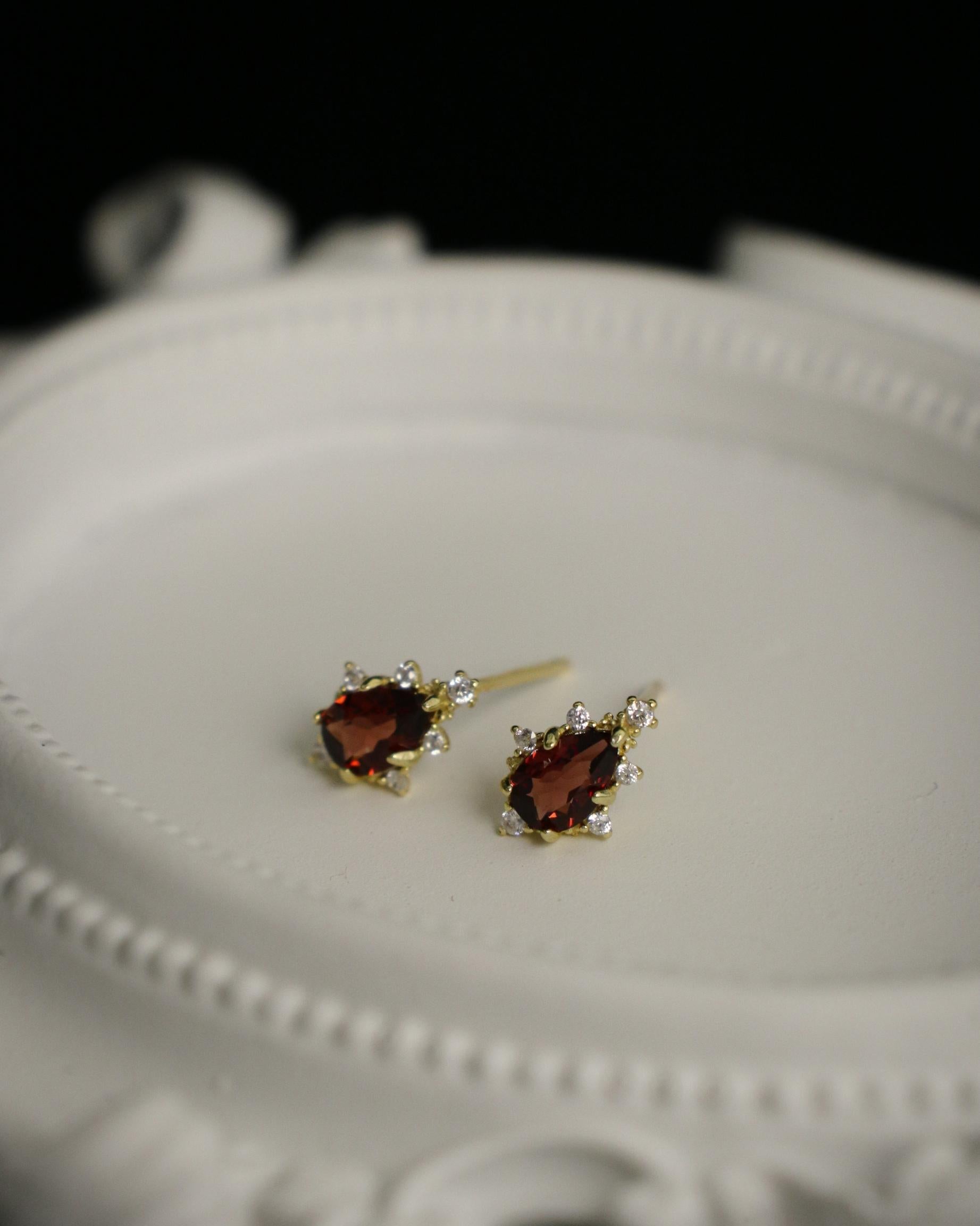 red crystal and zirconia stud earrings