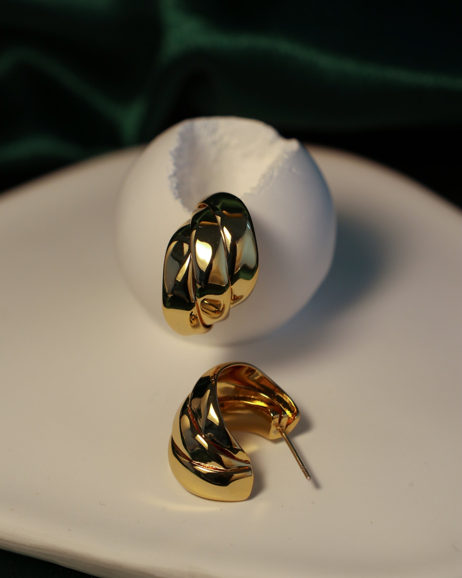 bold layered open hoop earrings on display