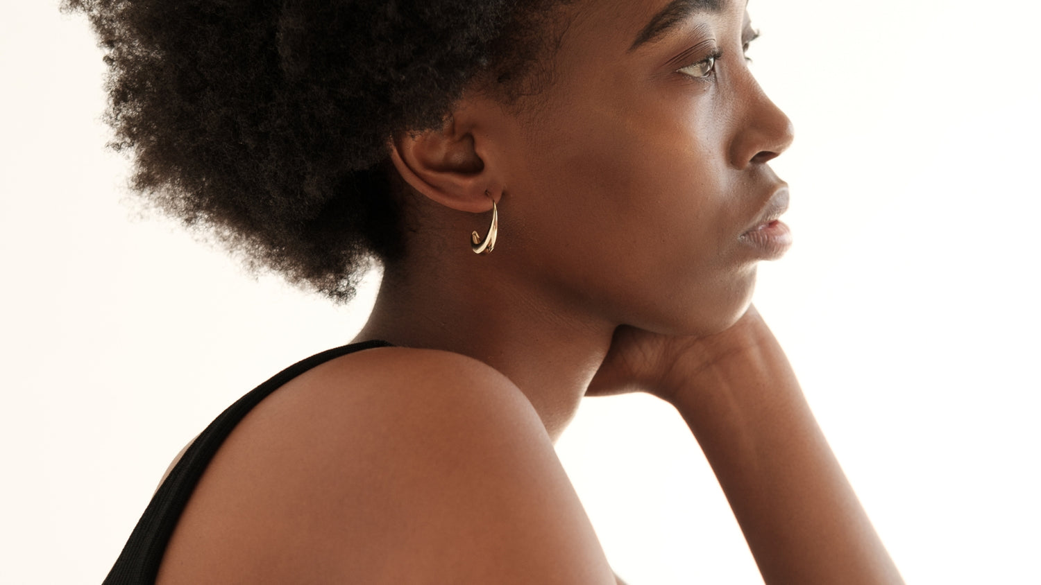 Woman wearing sterling silver earrings