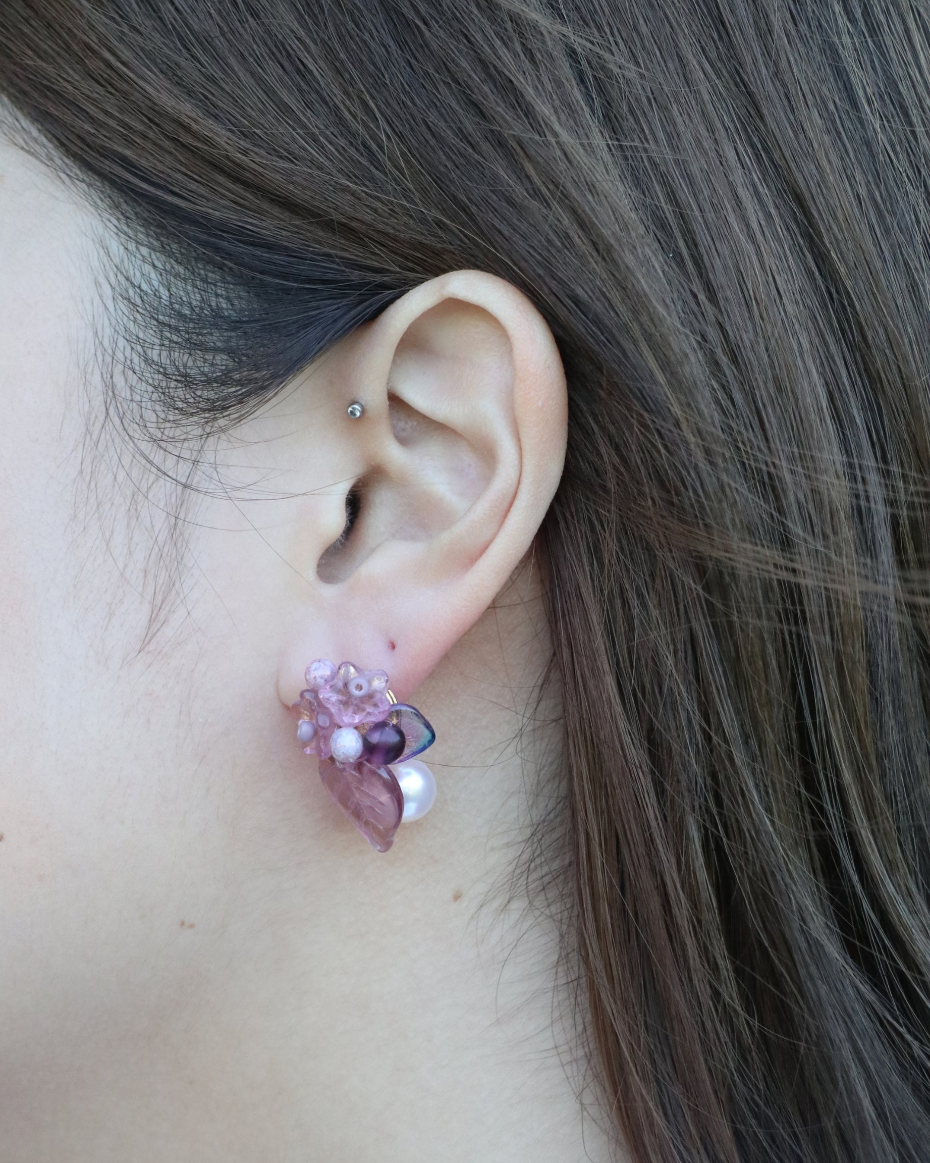blossom flower stud earrings on ear