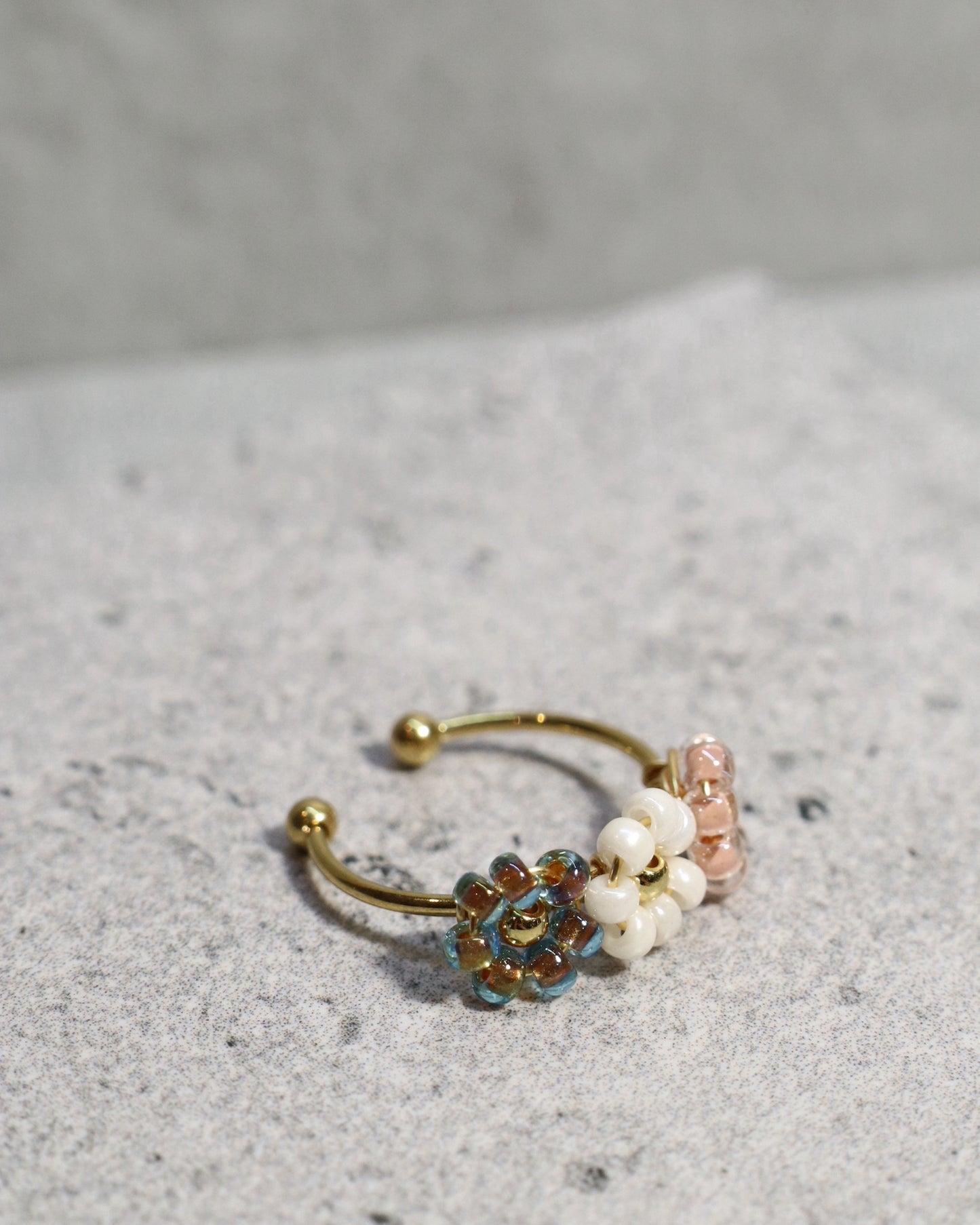 close up of floral beaded ring